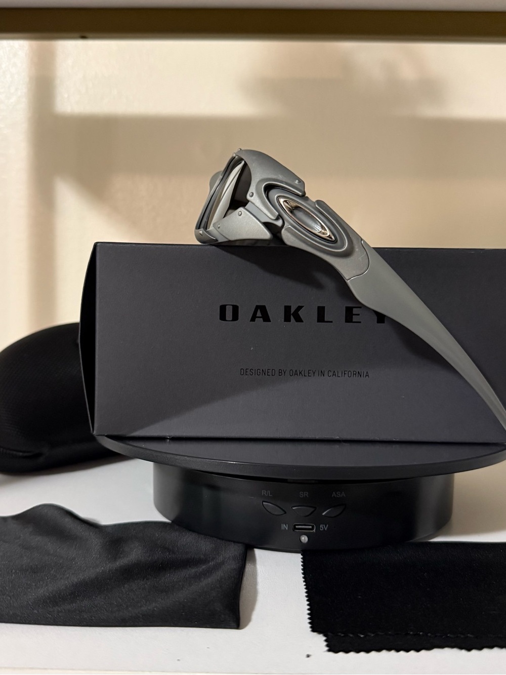Oakley Matte Gray Sport Sunglasses with Silver Icon